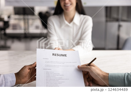 Positive female job applicant woman talking to two recruit managers Positive female job applicant woman talking to two recruit managers 124634489