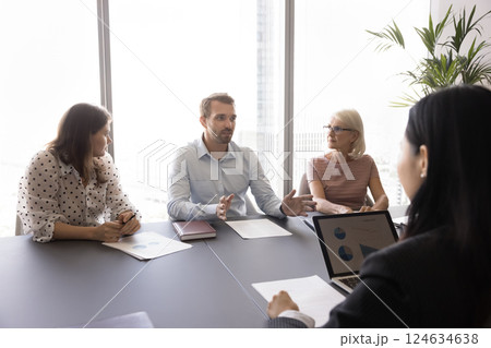 Boss discussing potential challenges or obstacles, offering solution during briefing 124634638