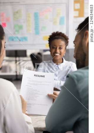 Happy African American job applicant woman meeting with two employers Happy African American job applicant woman meeting with two employers 124634683