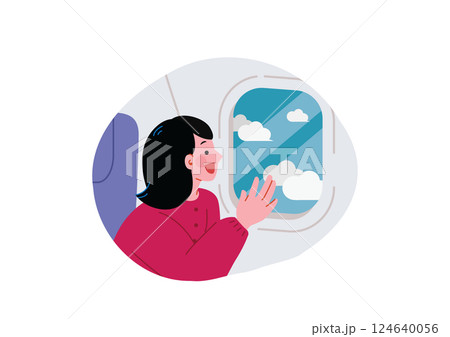 飛行機の窓から外を眺める女性 124640056