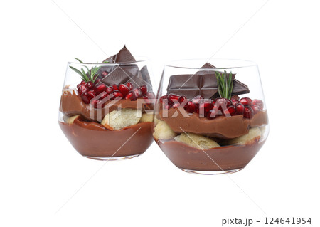 PNG, chocolate mousse in a glass with a pomegranate, isolated on a white background. PNG, chocolate mousse in a glass with a pomegranate, isolated on a white background. 124641954