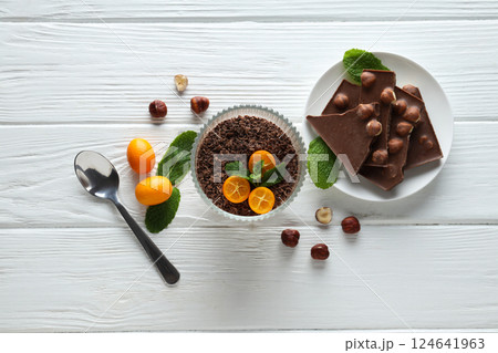 Preparation of chocolate mousse, on a light table. Preparation of chocolate mousse, on a light table. 124641963