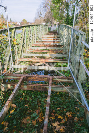 Bridge with a lot of rust and leaves on it Bridge with a lot of rust and leaves on it 124644603