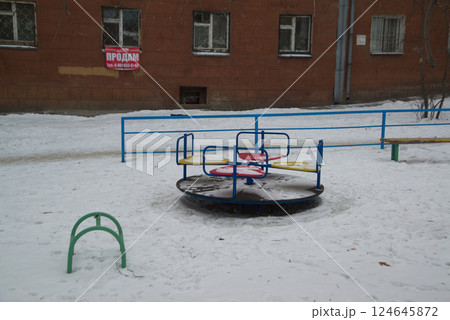 Playground that is densely covered with snow in winter at Irkutsk Oblast, Russia. 124645872