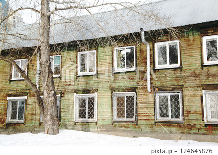 Old-style houses with distinctive windows can be found everywhere in Irkutsk city. Old-style houses with distinctive windows can be found everywhere in Irkutsk city. 124645876