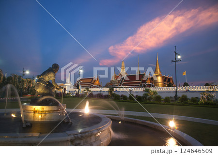 Beautiful lights decorate Wat Phra Kaew at sunset. This is a place of respect and tourism for Buddhists around the world. Located at Bangkok city in Thailand. 124646509