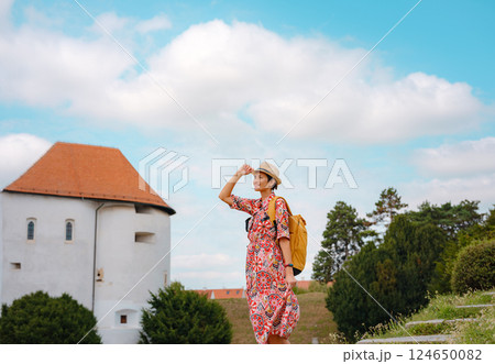 Woman Walking Through the Historic Center of Varazdin 124650082