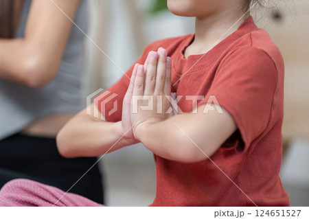 Mindfulness and Focus. A close-up of a child in meditation, embodying tranquility and presence. 124651527
