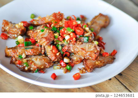 stir fried pork or deep fried pork , fried pork or crispy pork stir fried pork or deep fried pork , fried pork or crispy pork 124653681