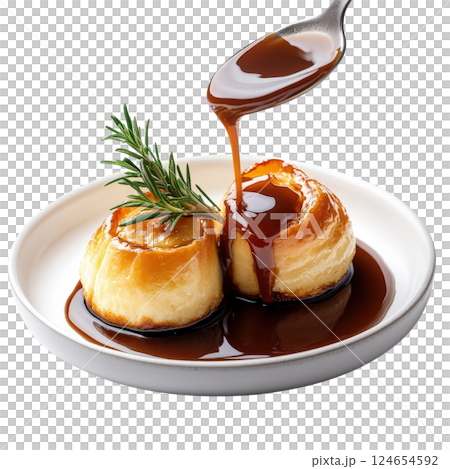 Delicious Homemade Pastry Drizzled with Sweet Honey Sauce and Garnished with Fresh Rosemary 124654592