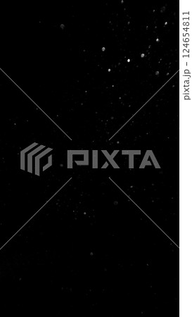 Freeze motion of dust particles flying , isolated on black background Freeze motion of dust particles flying , isolated on black background 124654811