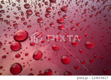 Beautiful Water Drops on Red Metallic Paint on the Car . Reflections and large Drops Beautiful Water Drops on Red Metallic Paint on the Car . Reflections and large Drops 124654817