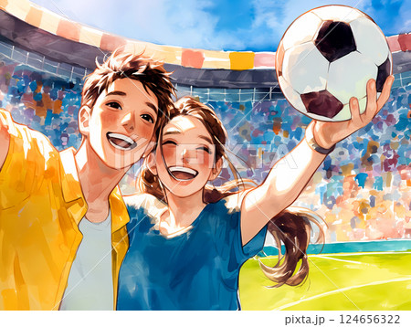 サッカーの試合を観戦している若いカップル 124656322