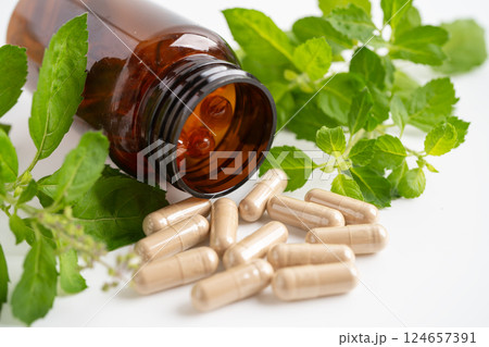 Alternative medicine herbal organic capsule, mineral, drug with herbs leaf natural supplements for healthy good life. 124657391