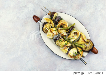 Freshly fish kebabs on skewers, barbecue. Freshly fish kebabs on skewers, barbecue. 124658851