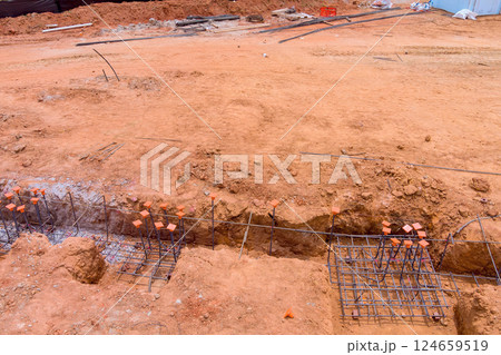 Prepare rebar foundations in construction site ready for next building stage. 124659519