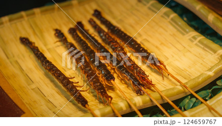 Chengdu, Sichuan, China. Fried Centipede Skewers. Cooked Insects Thread On Skewers. Popular Snacks In Southeast Asia. New Source Of Protein , Lipids, Minerals, And Vitamins. Modern Food Concept. Fried Chengdu, Sichuan, China. Fried Centipede Skewers. Cooked Insects Thread On Skewers. Popular Snacks In Southeast Asia. New Source Of Protein , Lipids, Minerals, And Vitamins. Modern Food Concept. Fried 124659767