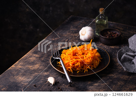 Spicy korean carrot salad in jar Spicy korean carrot salad in jar 124661629