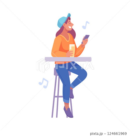 A Casual Young Woman in a Relaxed Atmosphere Enjoying Music at a Trendy Bar Setting 124661969
