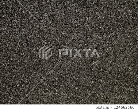 Close-Up Texture of Rough Asphalt Road Surface Close-Up Texture of Rough Asphalt Road Surface 124662560