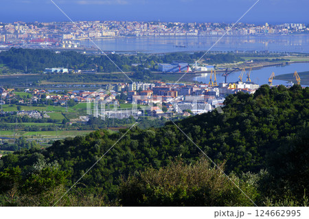 Santander industrial port and cityscape embracing the bay of santander, spain 124662995