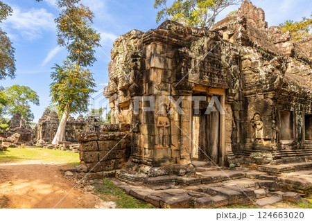 Ancient Hindu temple ruins of Banteay Kdei, adorned with statues, Angkor Archaeological Park, Siem Reap, Cambodia 124663020