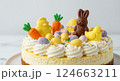 Easter cake sweets decorations. Chocolate bunny chick eggs carrots. Dessert recipe baking holiday theme. Close-up pastel colors photo 124663211