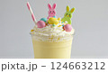 Easter milkshake dessert drink. Whipped cream bunnies candy toppings. Recipe blog kids party food. Close up pastel photo 124663212
