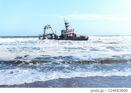 The famous shipwreck on Skeleton Coast in the Atlantic ocean 124663606