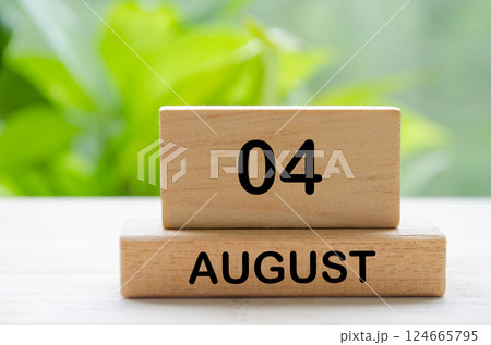 August 4 text on wooden blocks with customizable space for text or ideas. August month and calendar concept. August 4 text on wooden blocks with customizable space for text or ideas. August month and calendar concept. 124665795