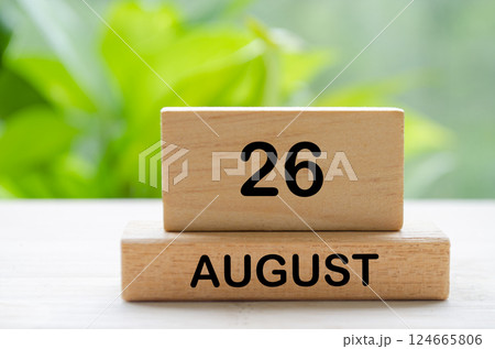 August 26 text on wooden blocks with customizable space for text or ideas. August month and calendar concept. August 26 text on wooden blocks with customizable space for text or ideas. August month and calendar concept. 124665806