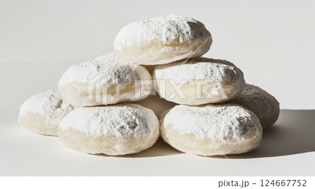 powdered sugar doughnuts stacked 124667752