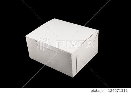 Side view white empty disposable paper fast food tray isolated on black background. Paper box isolated. Paper container Side view white empty disposable paper fast food tray isolated on black background. Paper box isolated. Paper container 124671311