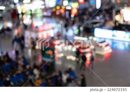 Blur background. Terminal Departure Check-in at airport with bokeh lights. Traveler at airport terminal blurrred background. Blur background. Terminal Departure Check-in at airport with bokeh lights. Traveler at airport terminal blurrred background. 124672193