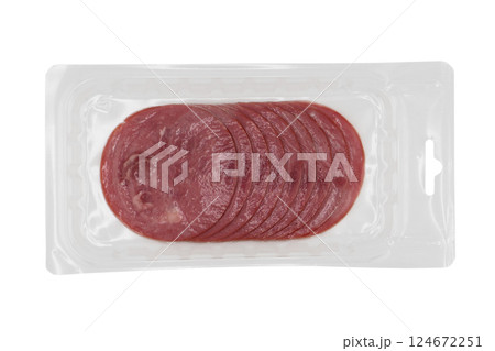 Sliced smoked beef meat in vacuum package isolated on white background. Raw smoked packaged meet isolated Sliced smoked beef meat in vacuum package isolated on white background. Raw smoked packaged meet isolated 124672251