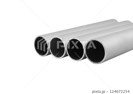 New high quality shiny galvanized stainless steel metal aluminium alloy pipes. Industrial construction materials isolated on white background. New high quality shiny galvanized stainless steel metal aluminium alloy pipes. Industrial construction materials isolated on white background. 124672254