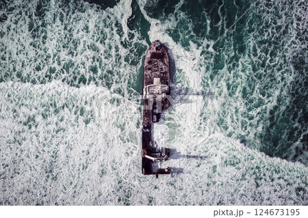 Aerial top view on the shipwreck in the Atlantic ocean Aerial top view on the shipwreck in the Atlantic ocean 124673195