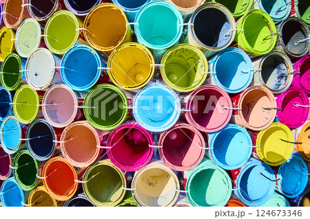 Vibrant Paint Cans in Symmetrical Array Overhead View Vibrant Paint Cans in Symmetrical Array Overhead View 124673346