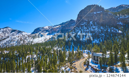Aerial of Snowy Peaks and Winding Road in Mt Charleston Nevada Aerial of Snowy Peaks and Winding Road in Mt Charleston Nevada 124674144