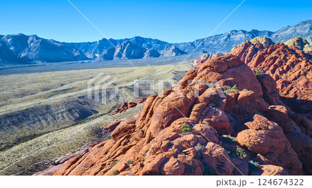 Aerial of Red Rock Canyon Sandstone Formations and Desert Road Aerial of Red Rock Canyon Sandstone Formations and Desert Road 124674322