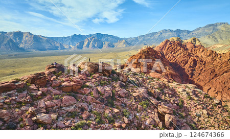 Aerial of Red Rock Canyon Sandstone and Hikers Exploring 124674366