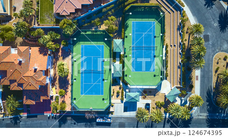 Aerial Top Down of Suburban Tennis Courts in Las Vegas Neighborhood 124674395