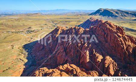 Aerial of Red Rock Canyon with Las Vegas Skyline in Distance 124674445
