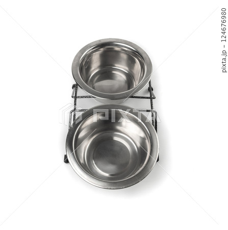 Metal pets bowl isolated, two food and water bowl set, dog food container, cat new empty dishes Metal pets bowl isolated, two food and water bowl set, dog food container, cat new empty dishes 124676980