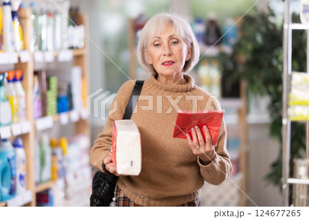 Woman choosing paper napkins Woman choosing paper napkins 124677265