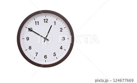 A simple round wall clock with a dark brown frame and a white face displaying 00:50/12:50. Isolated on a white background, perfect for time-related concepts, deadlines, and schedule themes. 124677669