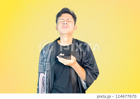Man Frustrated with phone 124677670