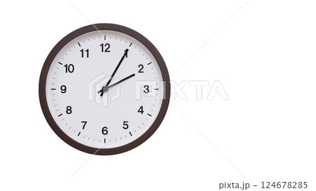 A simple round wall clock with a dark brown frame and a white face displaying 02:05/14:05. Isolated on a white background, perfect for time-related concepts, deadlines, and schedule themes. 124678285