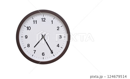 A simple round wall clock with a dark brown frame and a white face displaying 07:25/19:25. Isolated on a white background, perfect for time-related concepts, deadlines, and schedule themes. A simple round wall clock with a dark brown frame and a white face displaying 07:25/19:25. Isolated on a white background, perfect for time-related concepts, deadlines, and schedule themes. 124679514