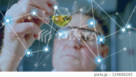 Image of network of connections and caucasian male scientist 124680205